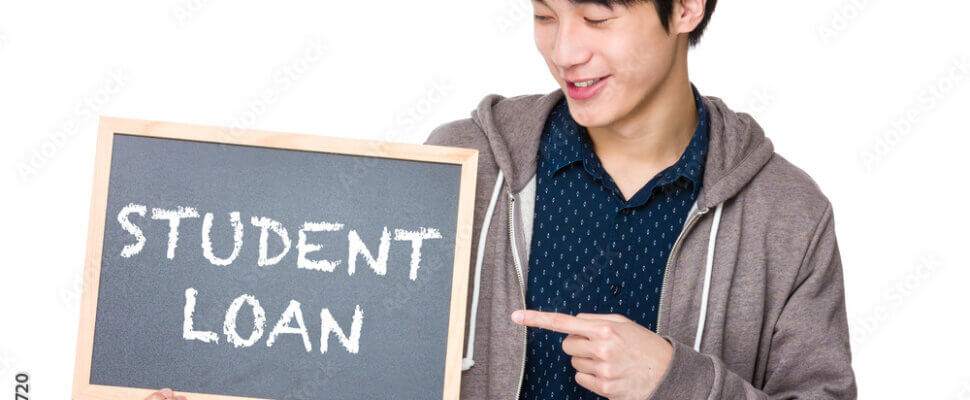 Young man finger point to chalkboard showing a phrases of studen